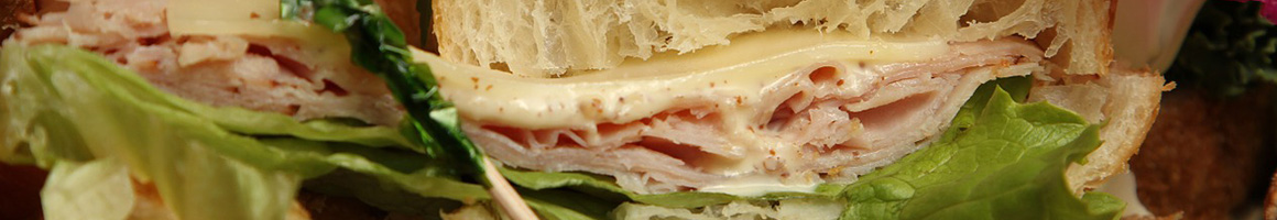 Eating Deli Italian Sandwich at Park Italian Gourmet restaurant in New York, NY.